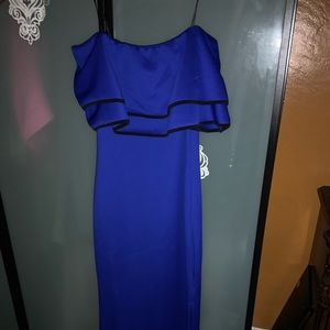 Long blue dress with ruffled top and slit